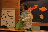 Imatge de Jin Akiyama druant la conferència